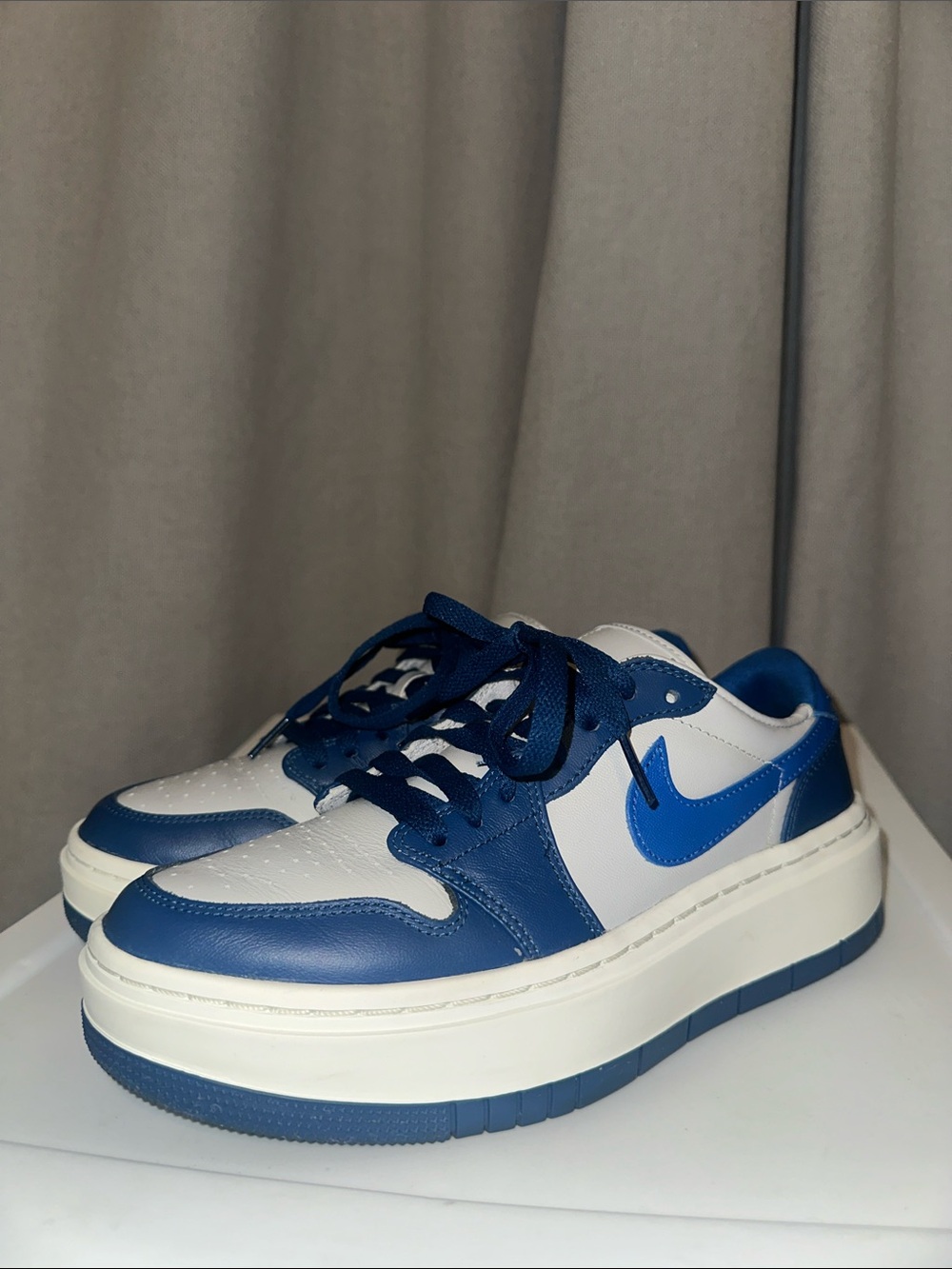 Nike Women’s Air Jordan 1 White and Royal Blue Low-Top Platform Sneakers